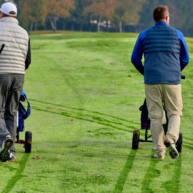 Golfers walking